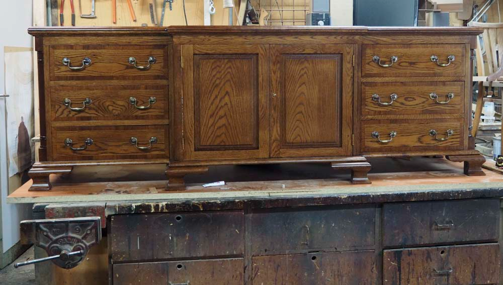 chest with cupboard at centre